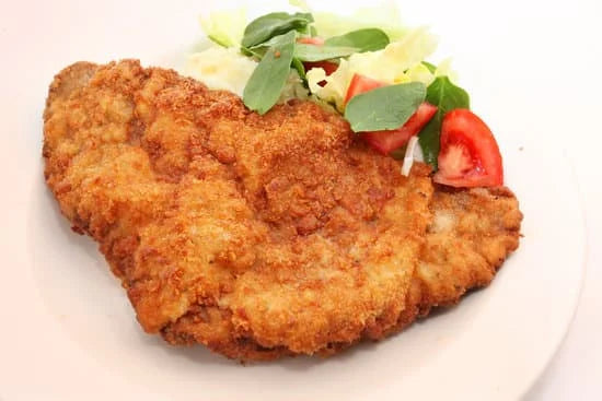 Knuspriges Schnitzel selber machen, braten und panieren – in leckerer Knusper-Kokoskruste